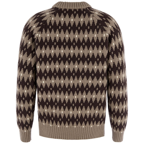 Fjällräven Övik Jacquard Knit M on tyylikäs ja lämmin miesten villapaita, joka sopii sekä jokapäiväiseen käyttöön että ulkoiluun. Pehmeän merinovillan ja shetlanninvillan yhdistelmä tuo neuleeseen luonnollista lämpöä ja hengittävyyttä. Villa siirtää kosteutta tehokkaasti ja lämmittää myös hieman kosteana, joten neule toimii hyvin vaihtelevissa sääolosuhteissa.
