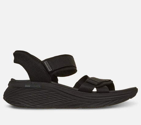 Skechers Slip Ins Max Cushioning Elite 2.0 Sandal Zoe on naisten sandaali, jossa yhdistyvät erittäin pehmeä Max Cushioning mukavuus, helppo pukeminen ja jalkaterää tukeva rakenne. Tämä Skechers sandaali on suunniteltu erityisesti kesäiseen kävelyyn, vapaa aikaan ja jokapäiväiseen käyttöön, kun kengältä halutaan keveyttä ja tehokasta vaimennusta.